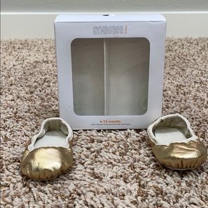 NWT Gymboree gold slip-ons/crib shoe (size 6-12m)